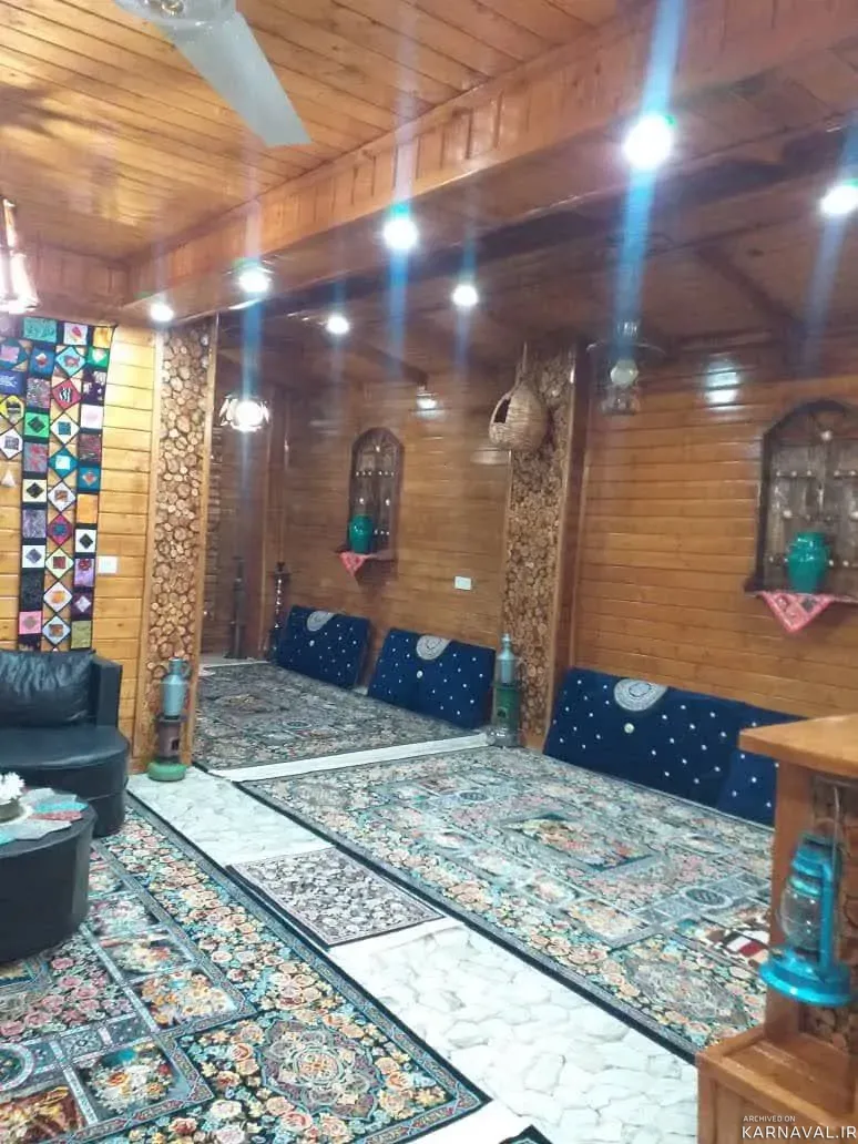 کلبه چوبی گل بابل