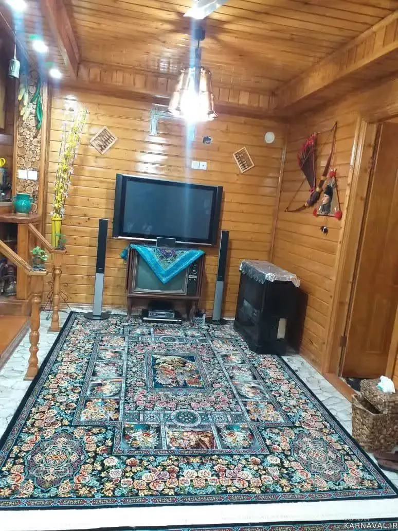 کلبه چوبی گل بابل