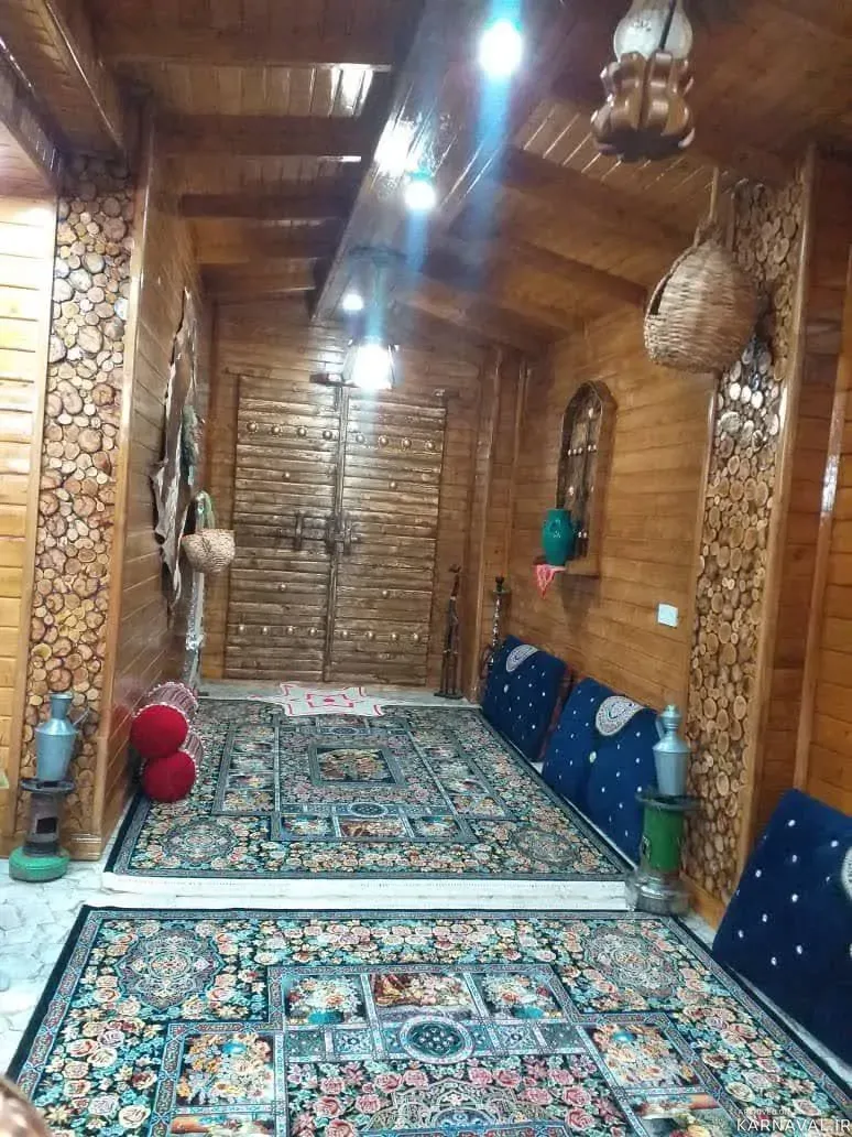 کلبه چوبی گل بابل