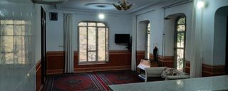 منزل ویلایی دارای تراسی با چشم انداز کوهستان منزل ویلایی دارای تراسی با چشم انداز کوهستان