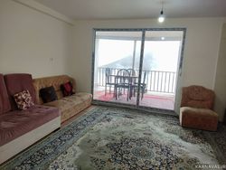 طبقه همکف با منظره کوه و جنگل و اقیانوسی از ابر طبقه همکف با منظره کوه و جنگل و اقیانوسی از ابر