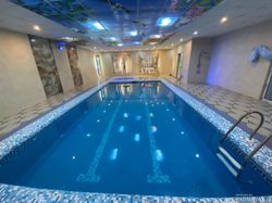 استخرآبگرم سرپوشیده وجکوزی،آلاچیق و آتشکده در حیاط استخرآبگرم سرپوشیده وجکوزی،آلاچیق و آتشکده در حیاط