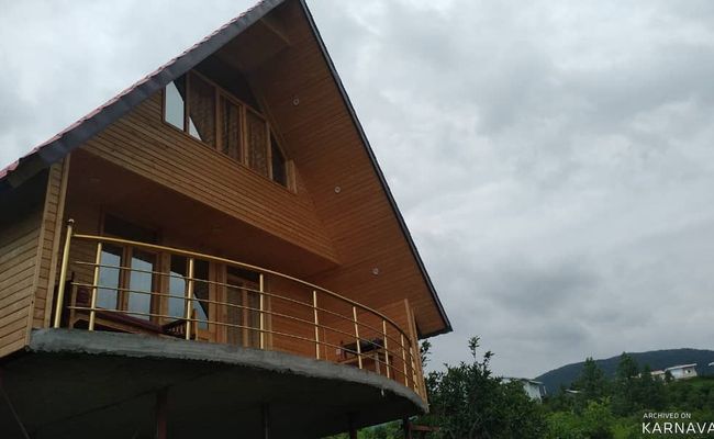 کلبه نقلی در دل باغ مرکبات و زمین چای کلبه نقلی در دل باغ مرکبات و زمین چای