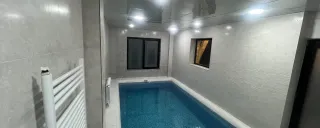 کلبه سوئیسی استخردار آبگرم آرامش رامسر کلبه سوئیسی استخردار آبگرم آرامش رامسر